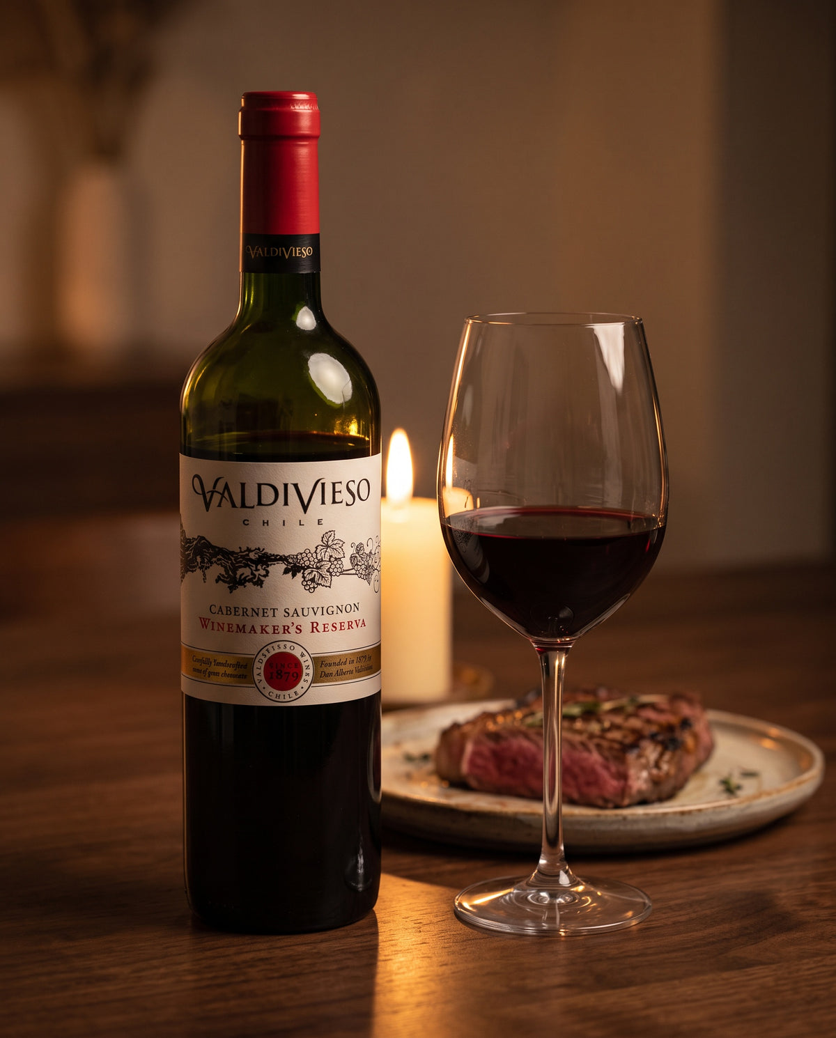 Valdivieso Winemaker's Reserve Cabernet Sauvignon at a candlelit dinner table with grilled steak