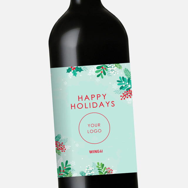 Wine bottle with a festive label reading 'Happy Holidays' on a light gray background