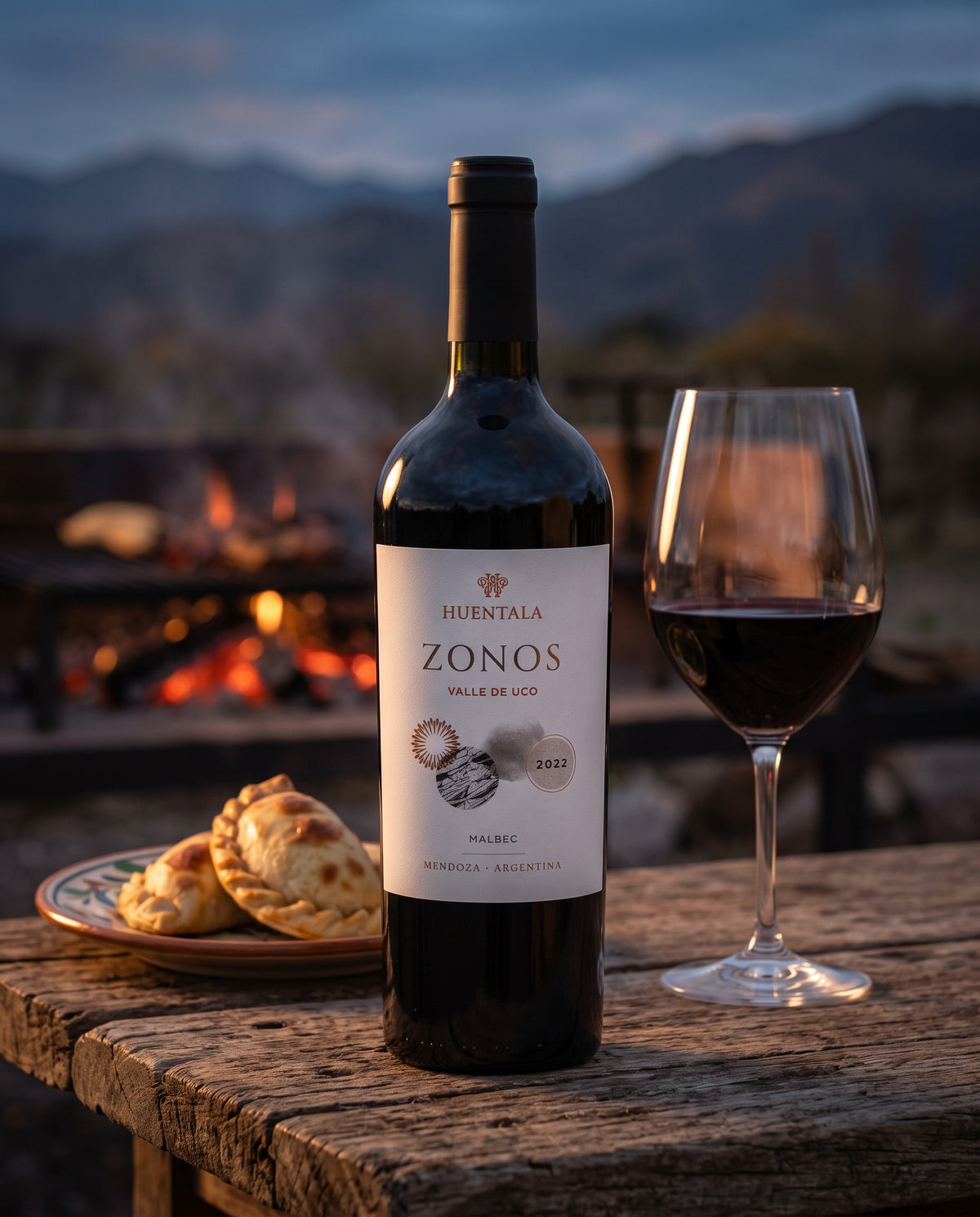 Huentala Zonos Malbec at a parrilla grill in the Uco Valley with empanadas