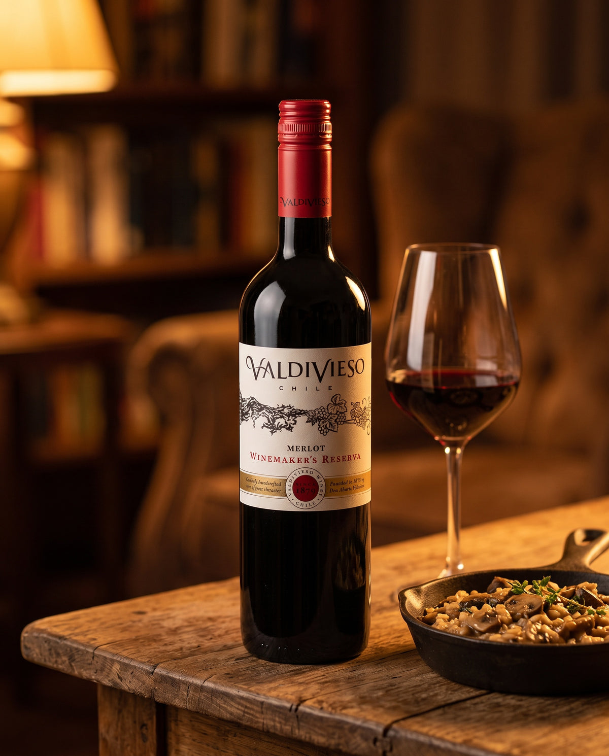 Valdivieso Winemaker's Reserve Merlot by a fireside table with mushroom risotto